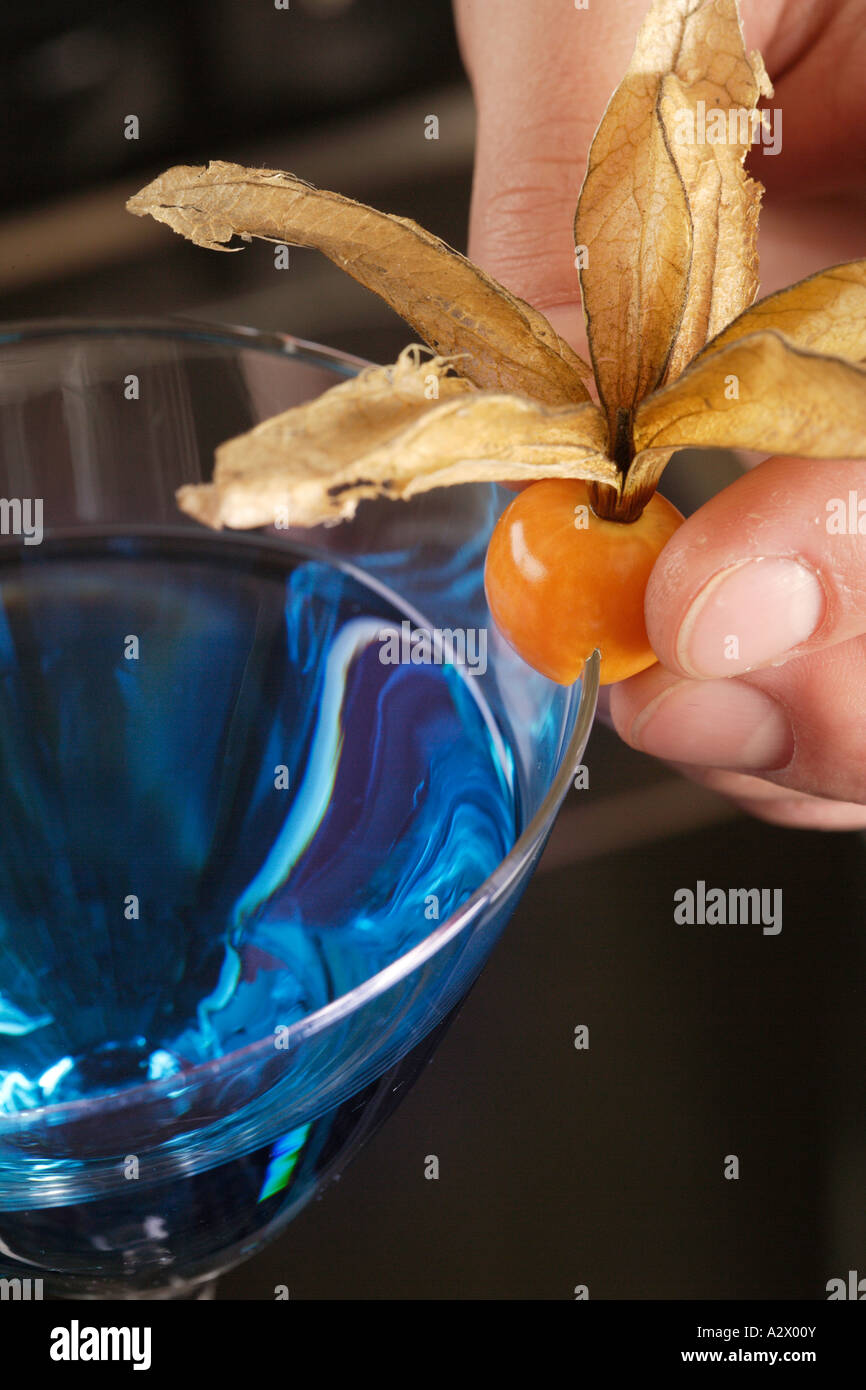 Physalis and a cocktail Blue Lady Stock Photo - Alamy