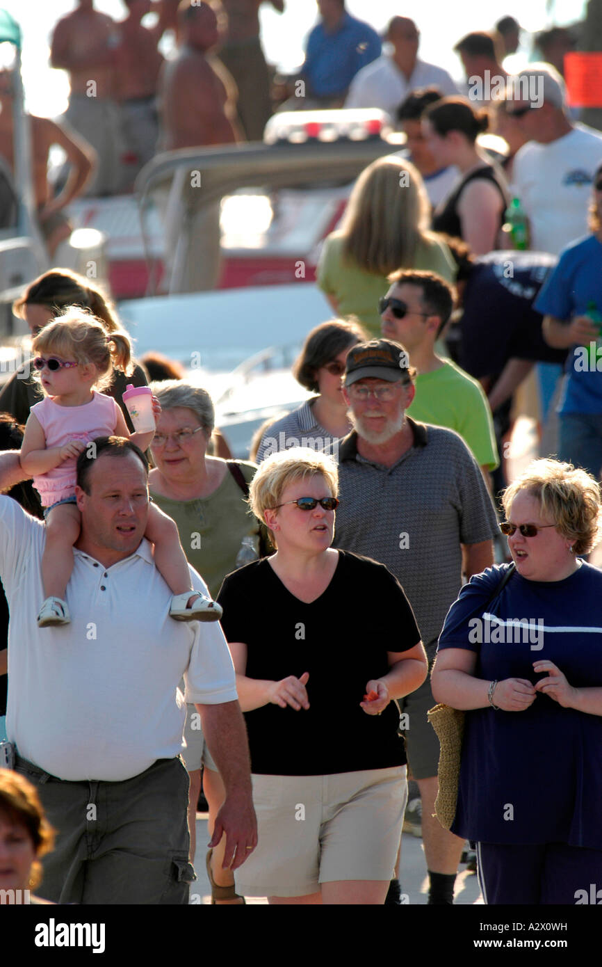 A large group of people all walking in the same direction Stock Photo ...