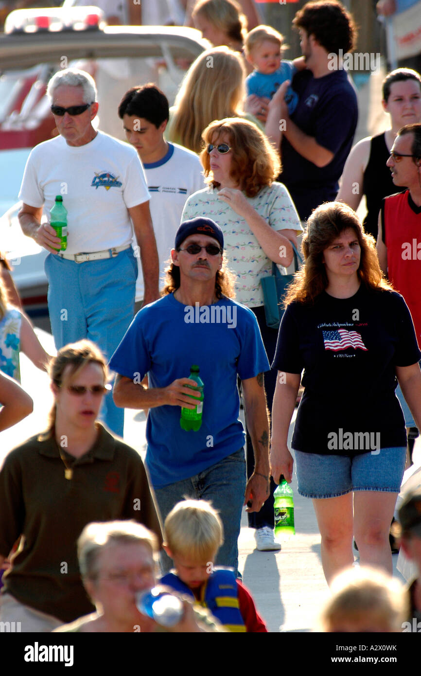 A large group of people all walking in the same direction Stock Photo ...
