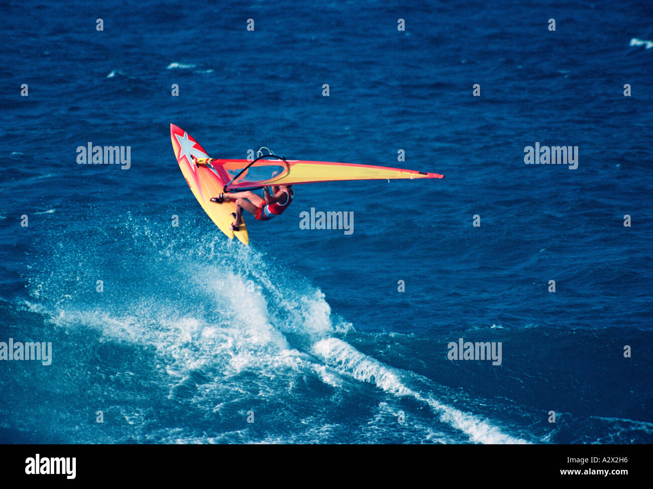 Windsurfing spray hopping sail hires stock photography and images Alamy