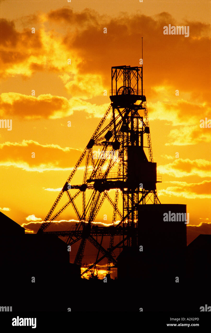 Western Australia. Kalgoorlie. Cassidy Shaft gold mine silhouette at sunset. Stock Photo