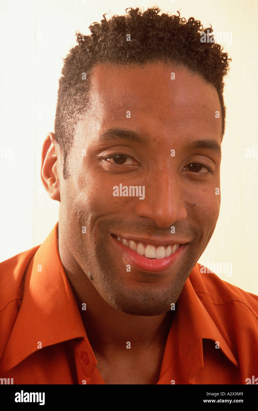 Portrait of young man smiling. Stock Photo