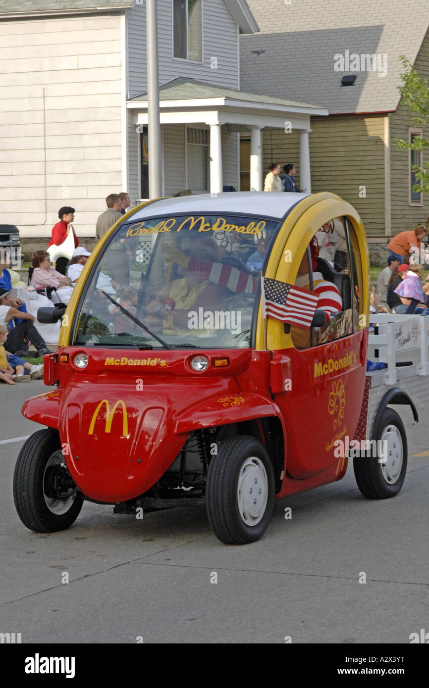Ronald McDonald in his vehicle at a parade in Detroit