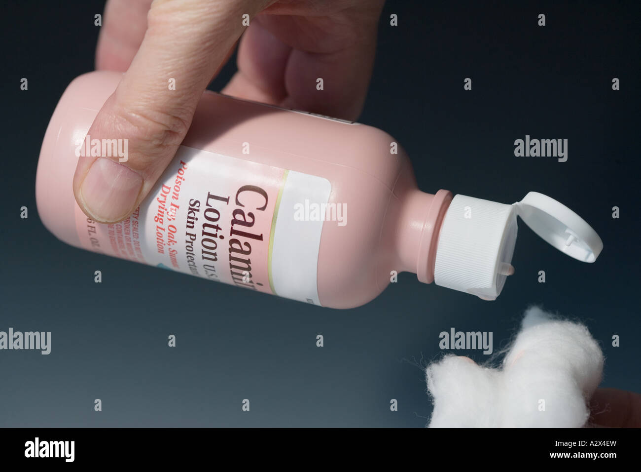Calamine lotion is often used to relieve the pain of itching due to allergens like Poison Ivy. Stock Photo