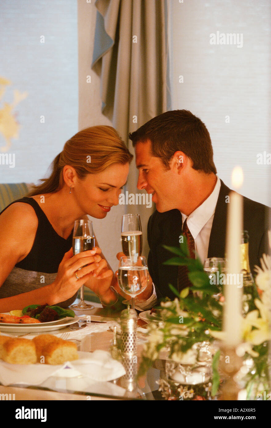 Couple having dinner in a restaurant. Stock Photo