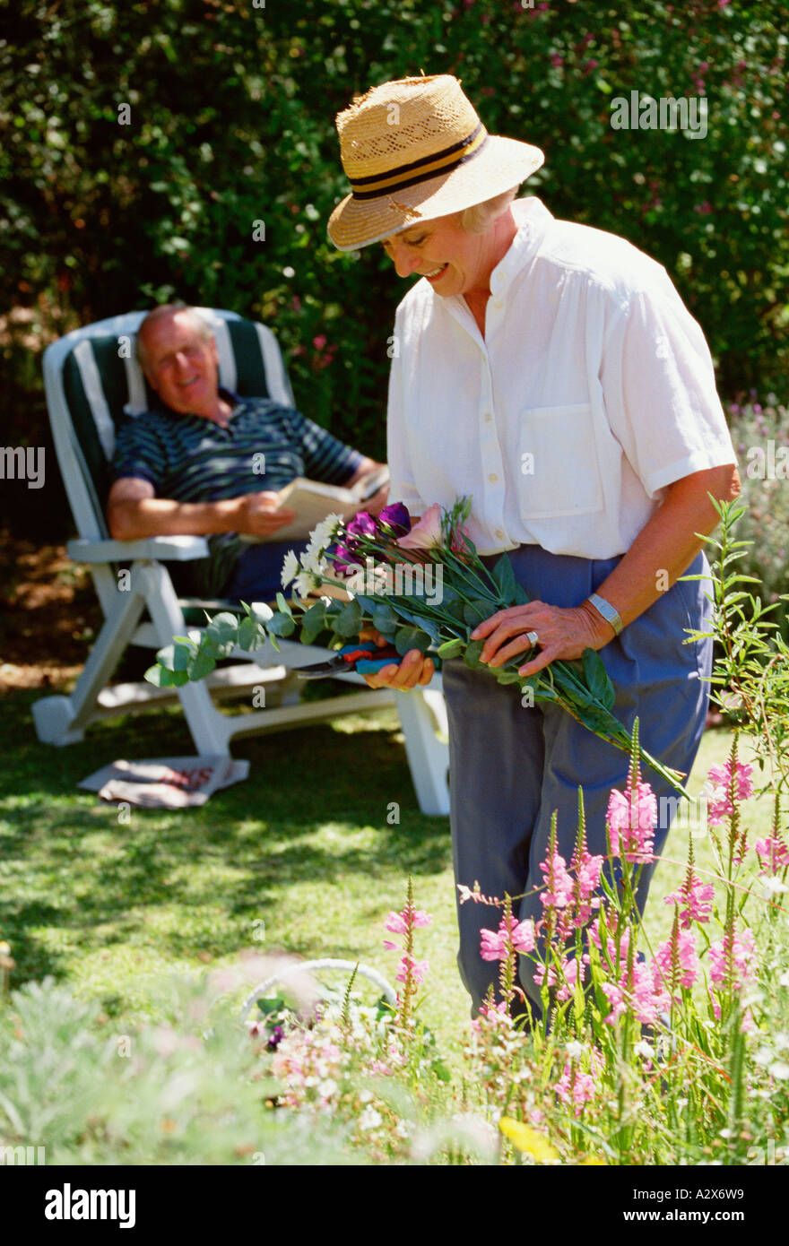 Seniors. Retired couple in their garden. Stock Photo