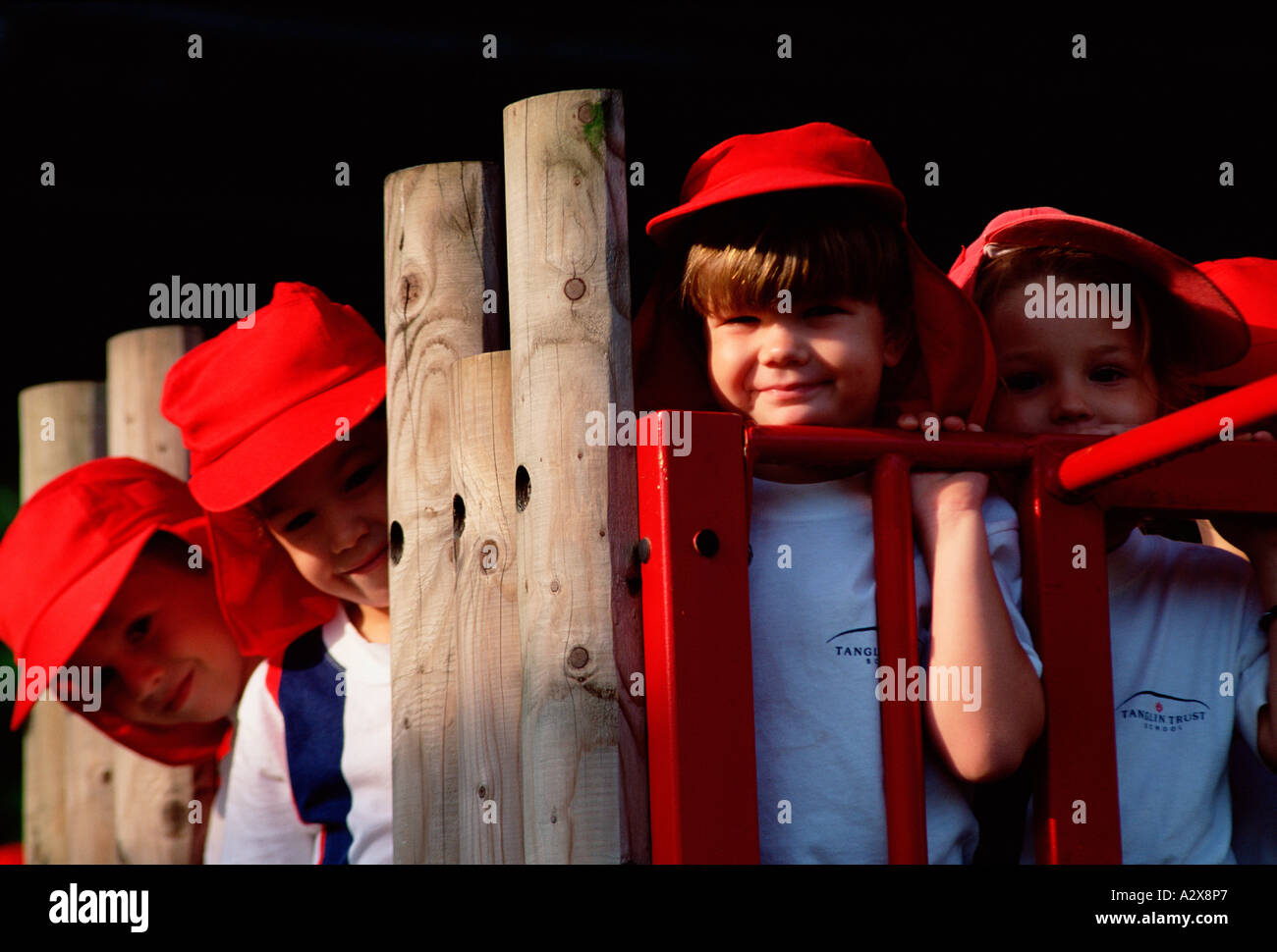 Schoolchildren. Group of boys outdoors in play park Stock Photo - Alamy