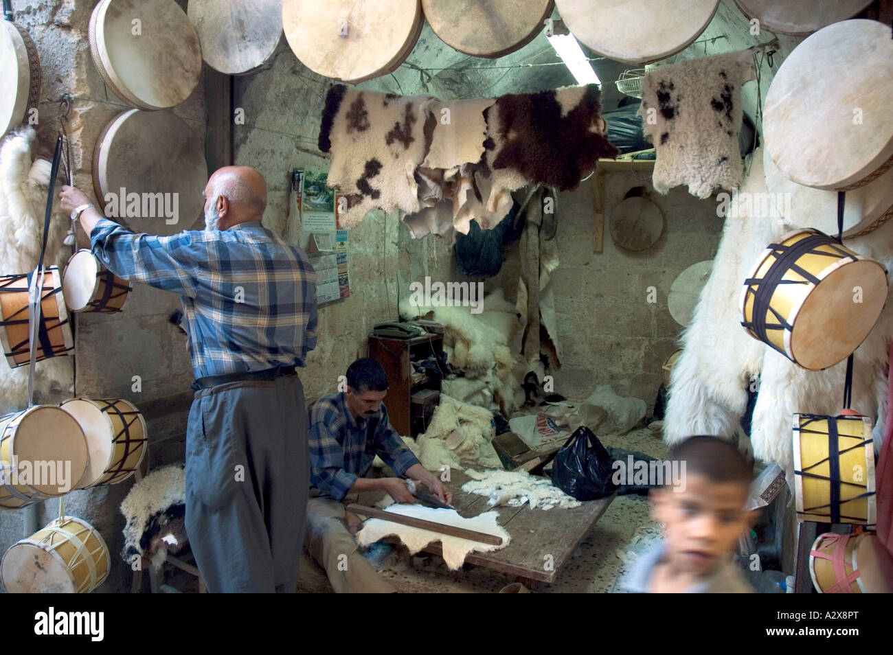 Traditional drum makers in Urfa Bazaar, Turkey. Stock Photo