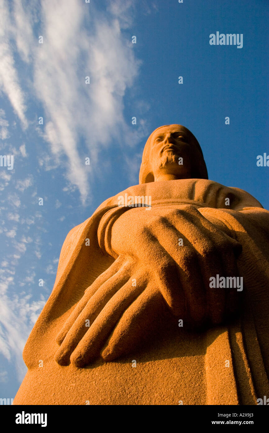 Statue of Jesus Christ against a cloudy , blue sky Stock Photo - Alamy