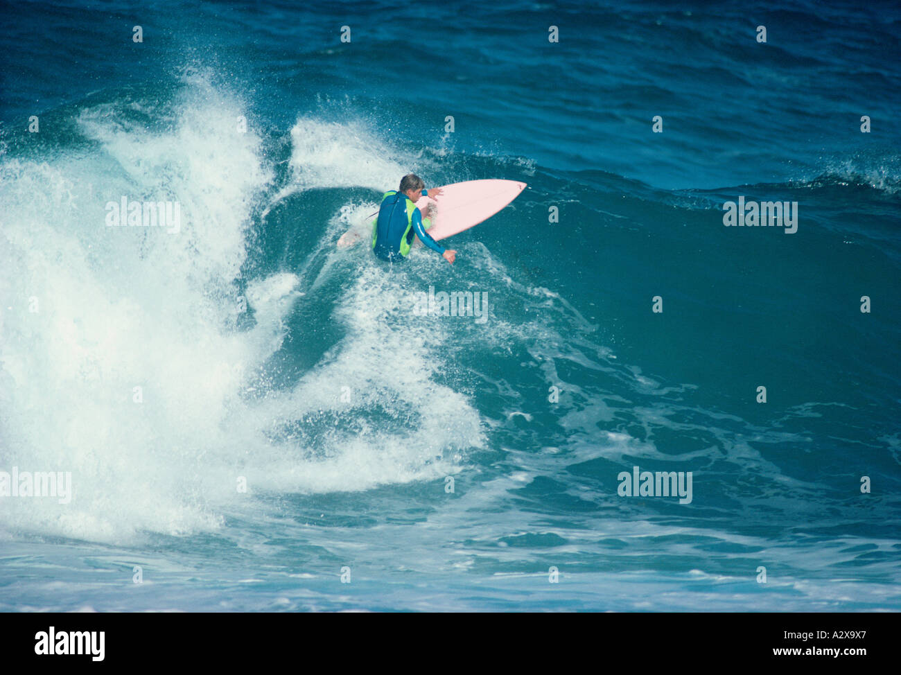 Surfing man. Stock Photo
