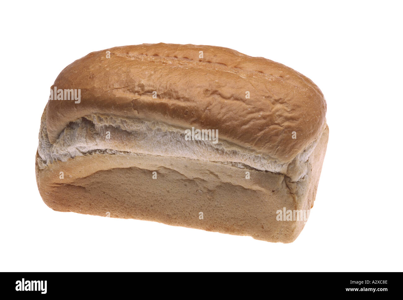 Unsliced loaf of homemade bread isolated on white background Stock Photo