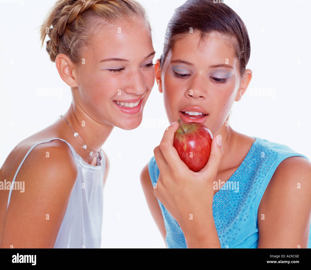 Studio portrait of two teenage girls Stock Photo - Alamy