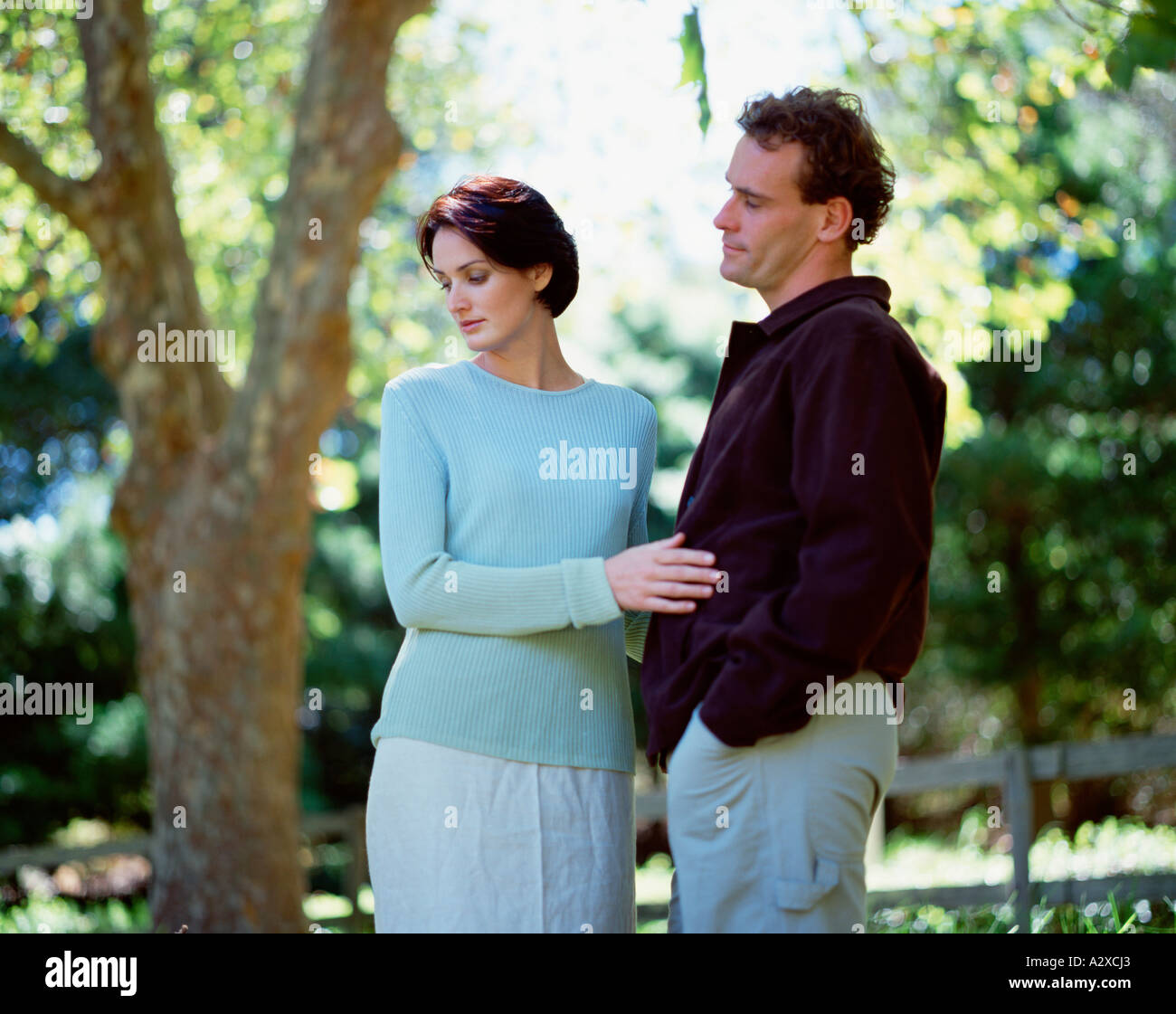 Young couple outdoors in the park. Stock Photo