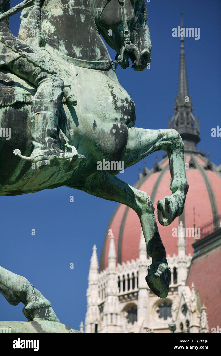 Detail of equestrian statue Rakoczi with Parliament behind, Budapest. Stock Photo