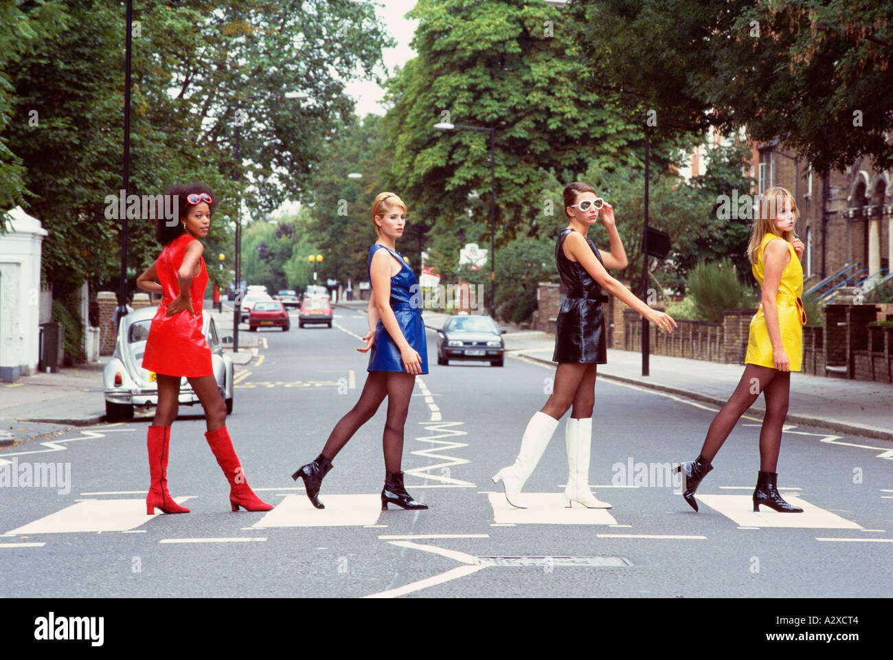 United Kingdom. England. London. Abbey Road. Sixties fashion models on zebra crossing. Stock Photo