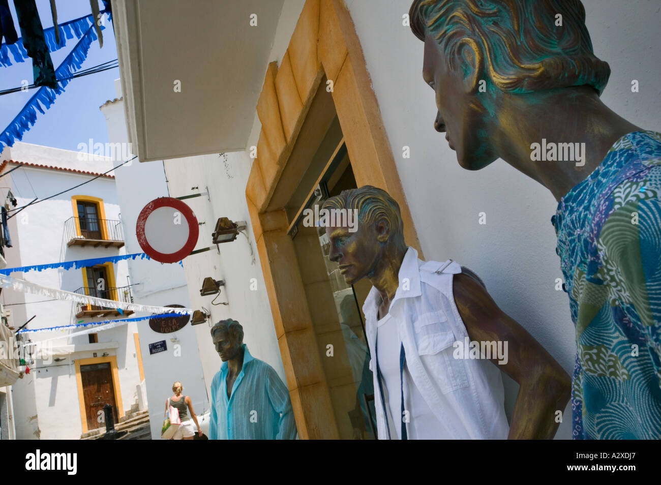 Clothes shop mannequins in the Sa Penya district, Ibiza City. Stock Photo