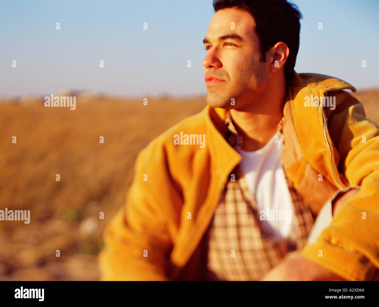 Outdoor portrait of man in yellow jacket Stock Photo Alamy