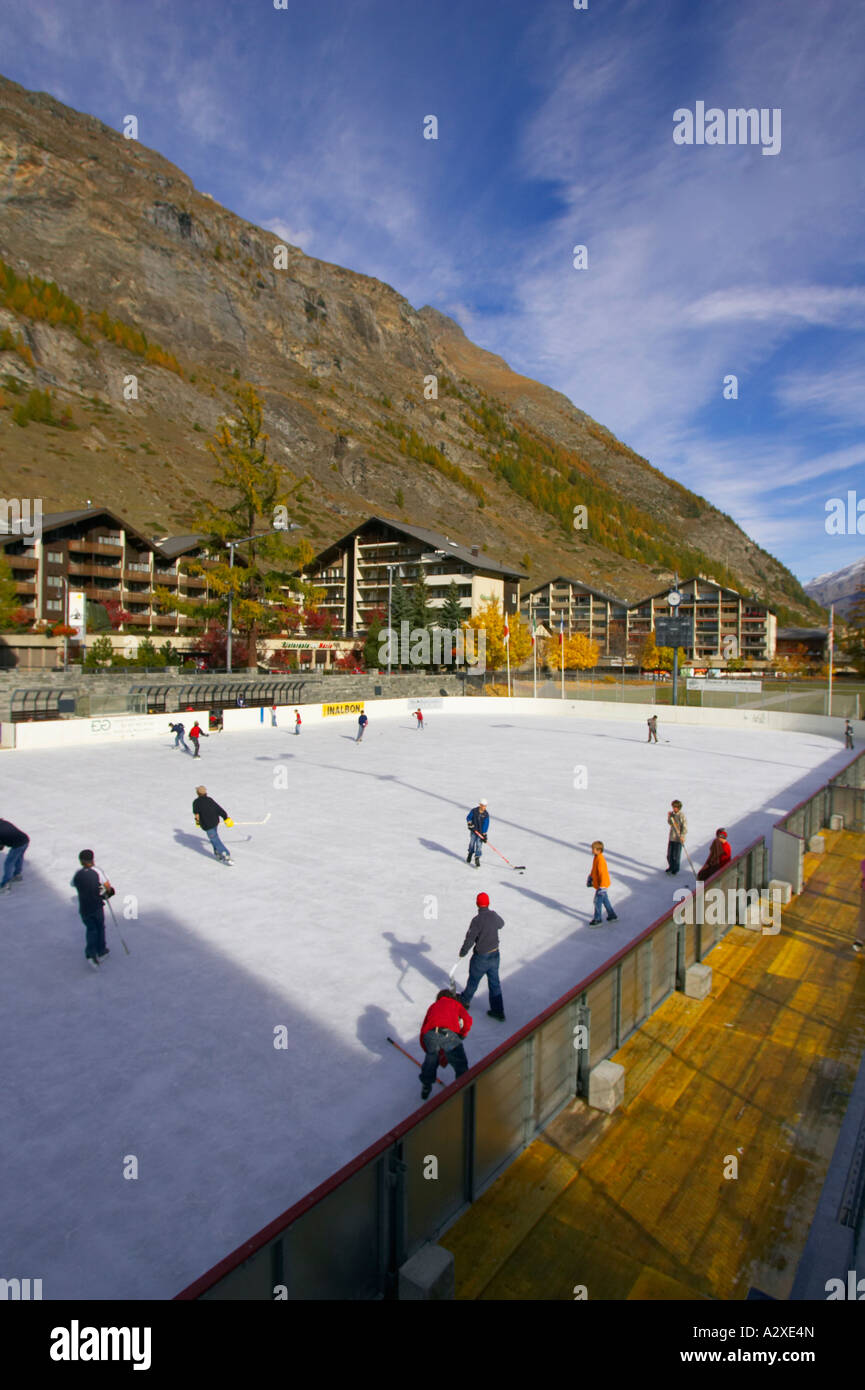 Children Playing On Ice Rink, Zermatt, Switzerland Stock Photo Alamy