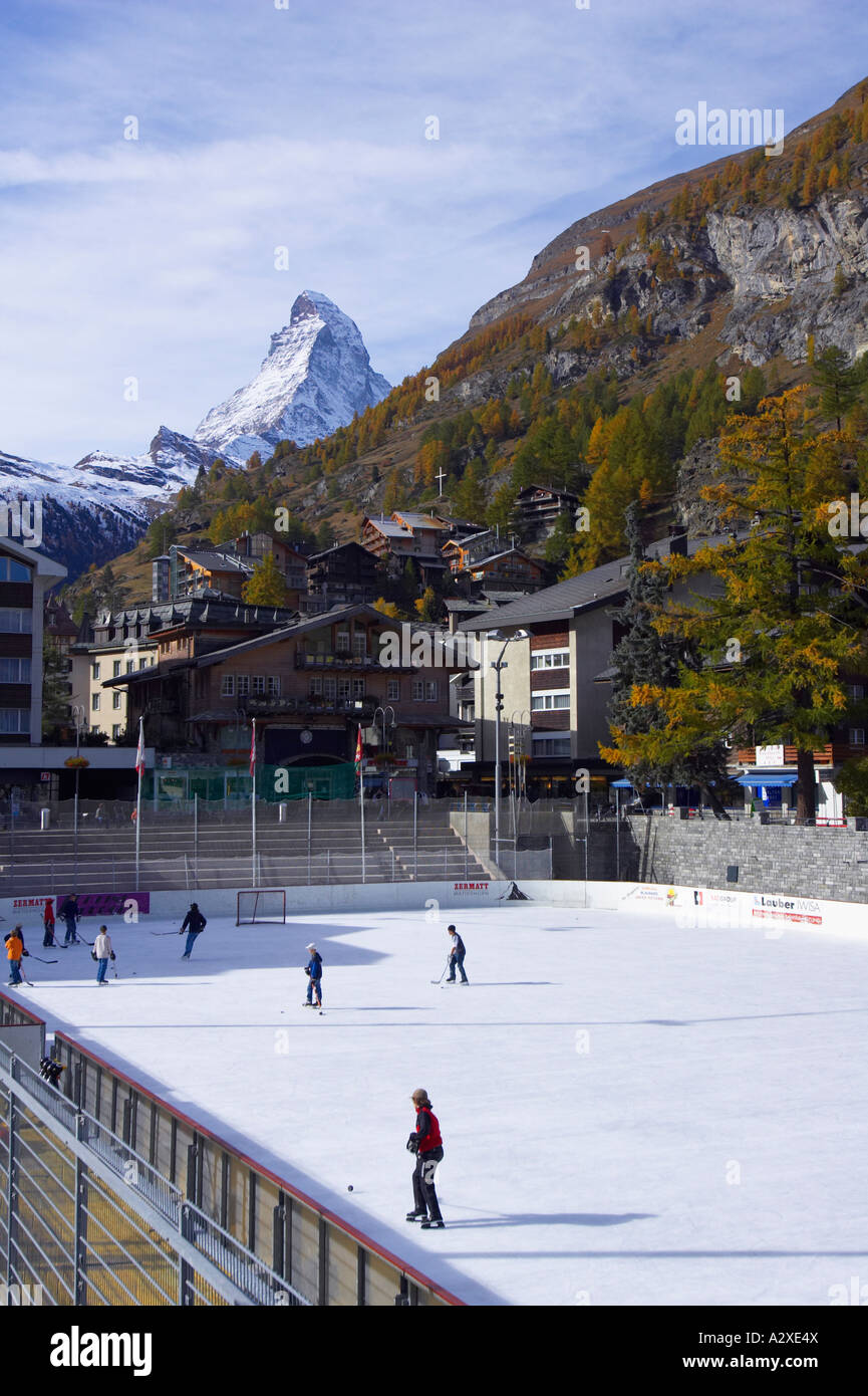 Children Playing On Ice Rink With The Matterhorn In Background, Zermatt