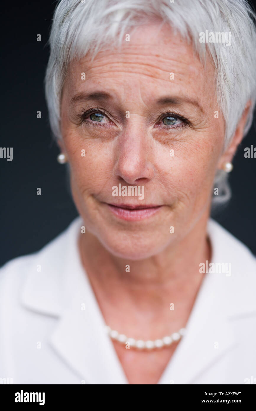 Close up of senior woman looking up Stock Photo