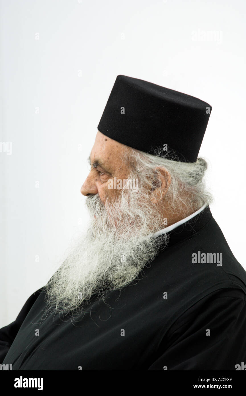 Greek Orthodox priest inside the chapel 