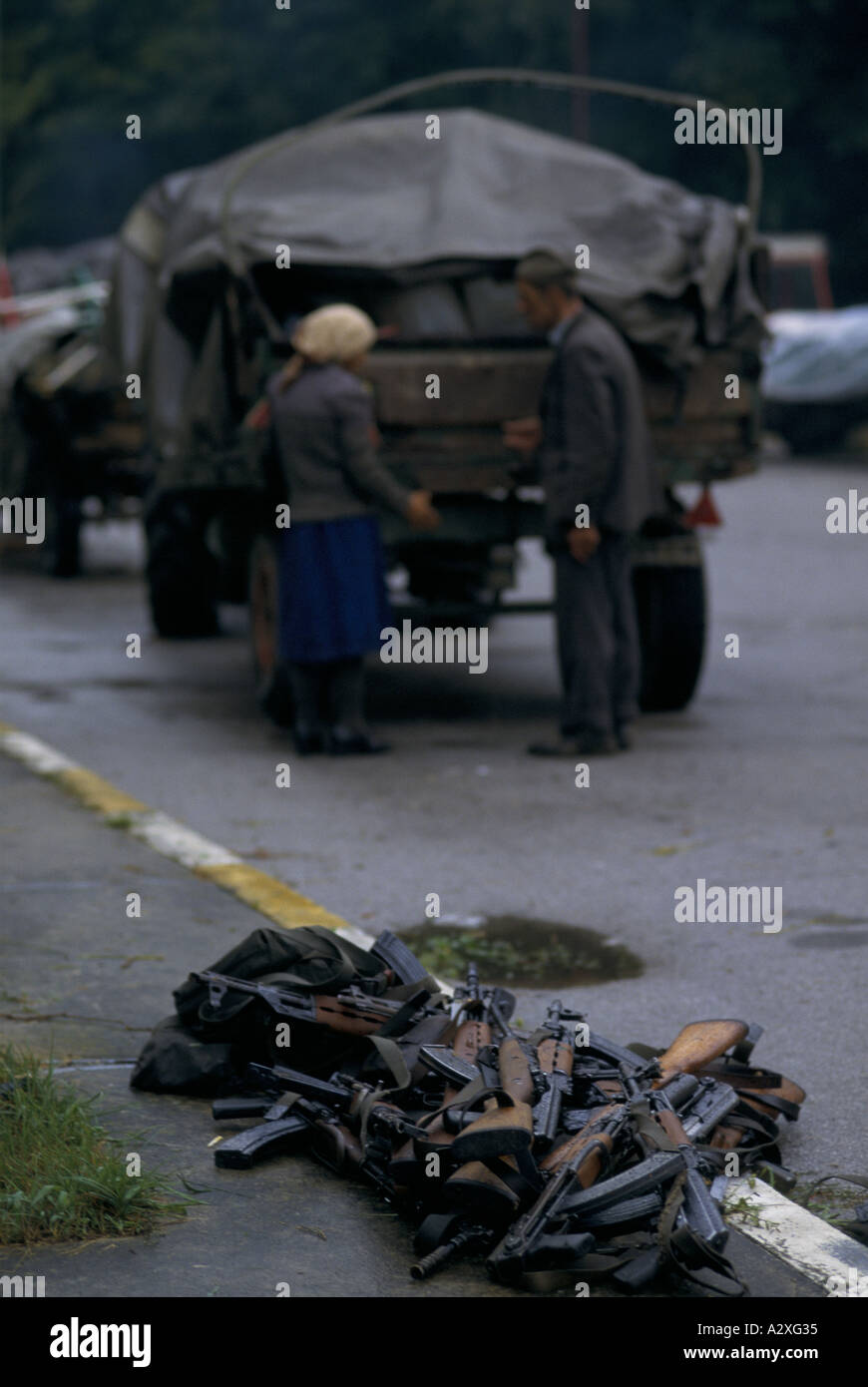 Croatian re-capture of Krajina, Aug 95: AK-47 rifles lie in a pile at Topusko as retreating Serb soldiers have surrendered them. Stock Photo