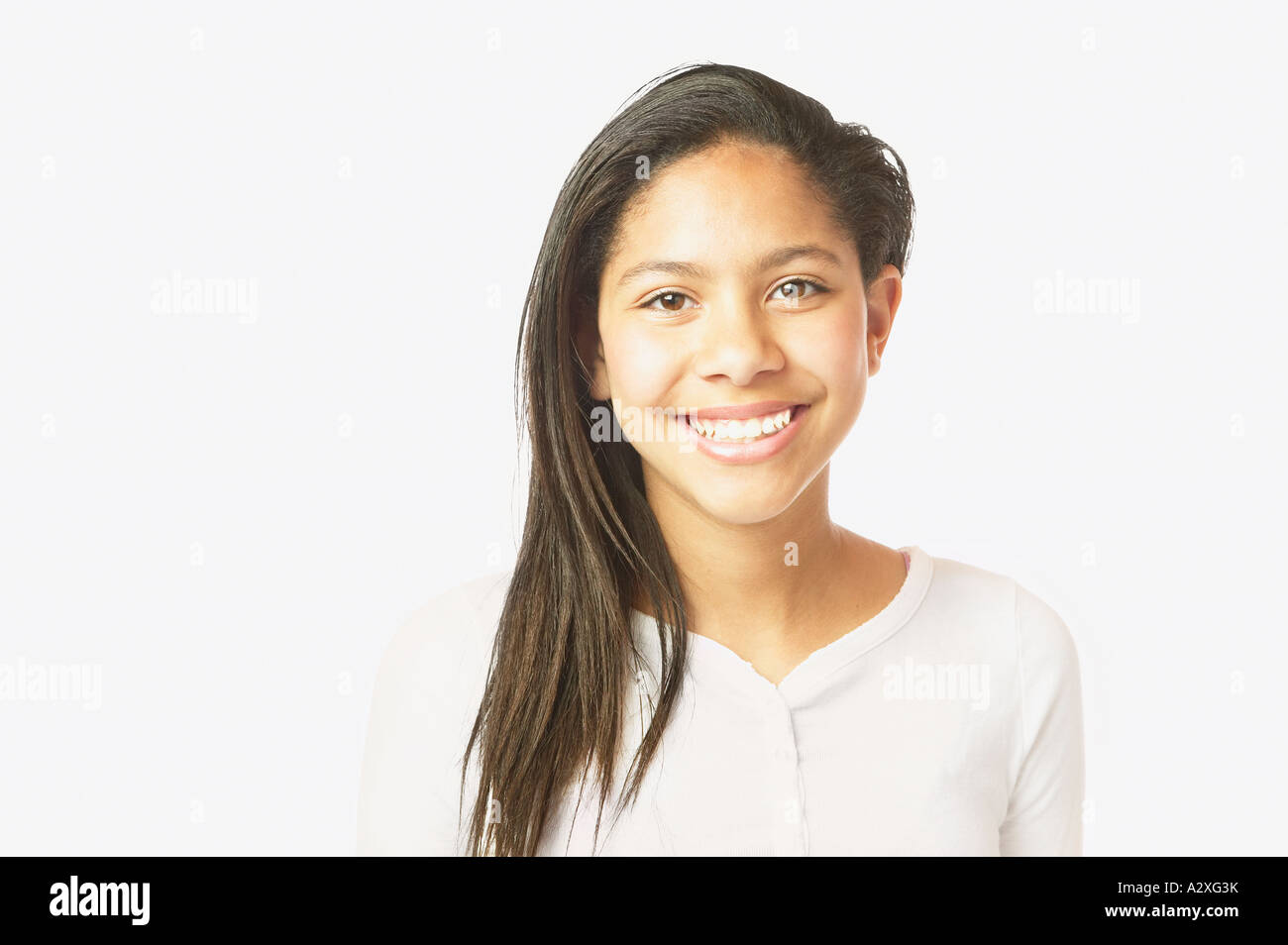 Studio shot of African girl smiling Stock Photo - Alamy