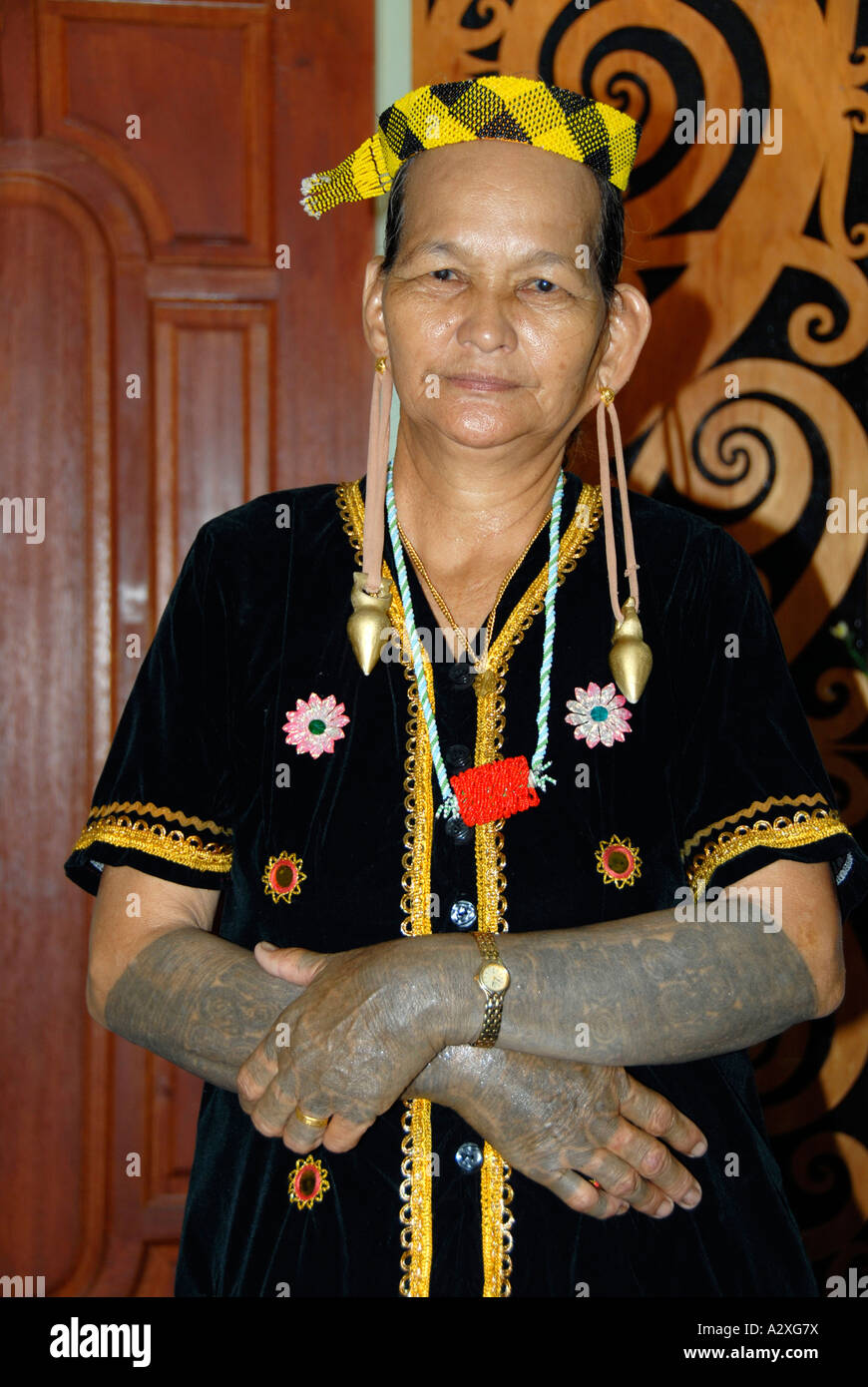 Malay woman with traditional tatoos on her forearms Long Bedian Sarawak