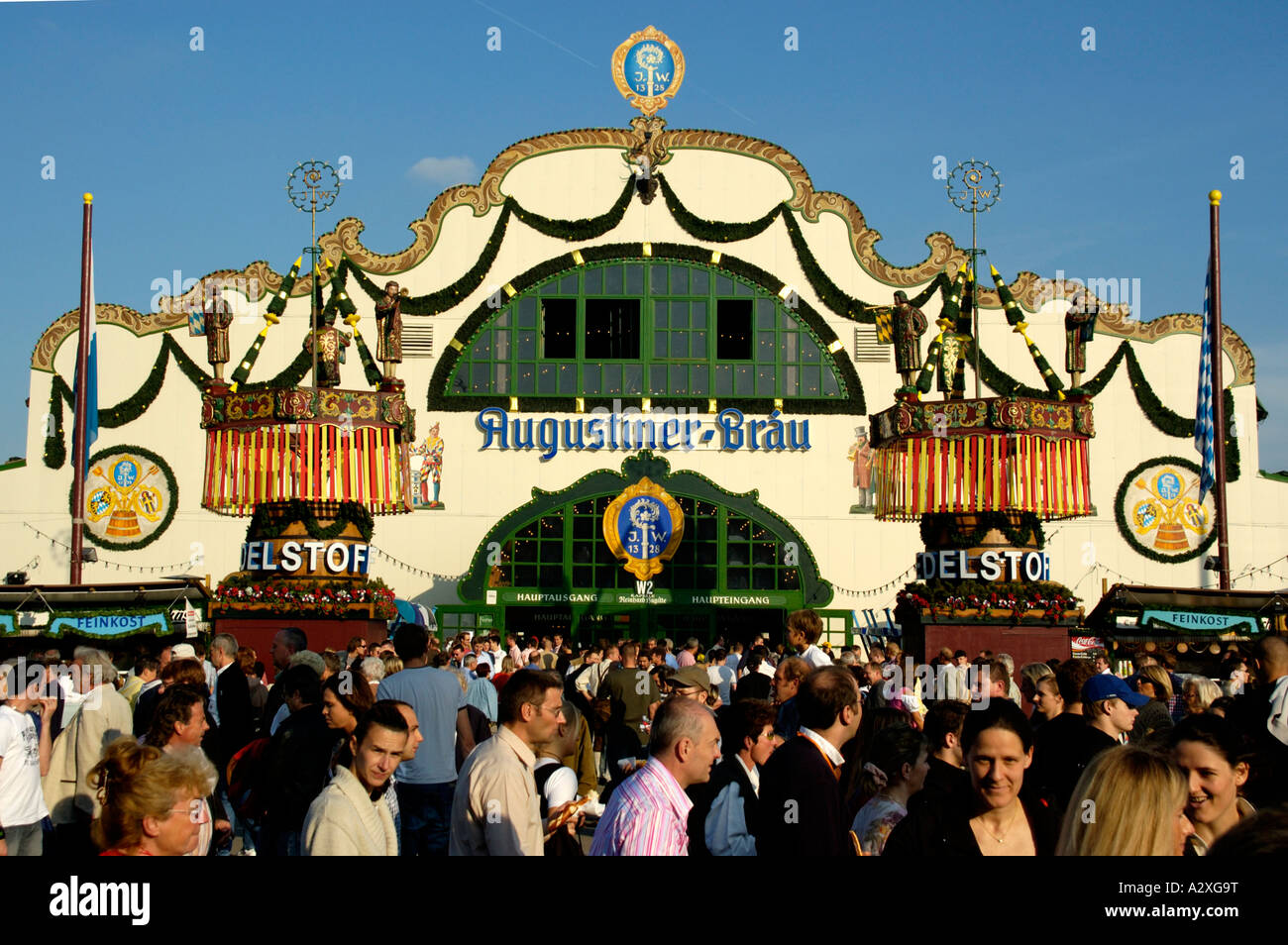 People in front of the Augustiner Braeu Brau tent Octoberfest Munich Bavaria Germany Stock Photo