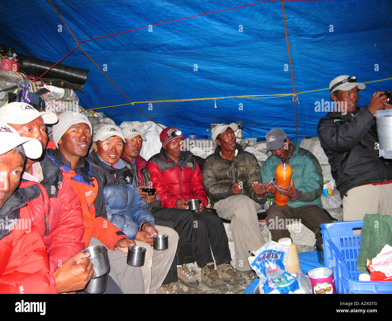 Victory party of the sherpa expedition crew in the Base camp, 5300m, Mount Everest, Himalaya, Nepal Stock Photo