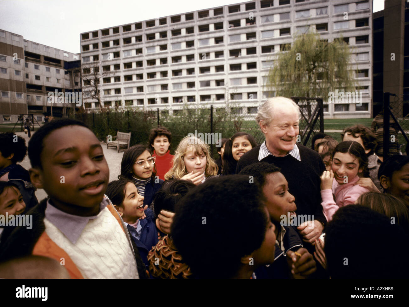children in urban area with adult Stock Photo