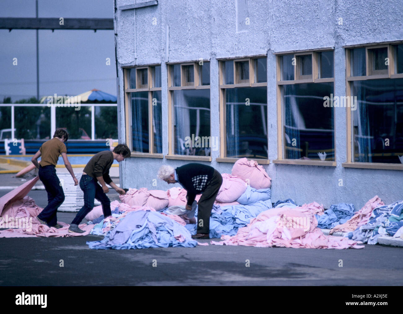 men working on laundry at butlins holiday camp skegness Stock Photo