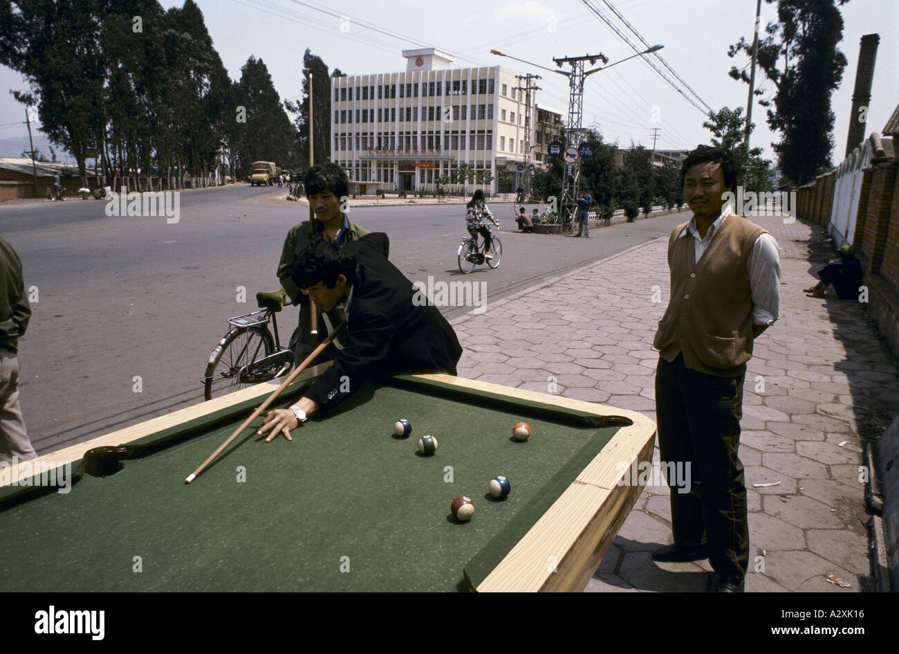 playing pool in the street Stock Photo
