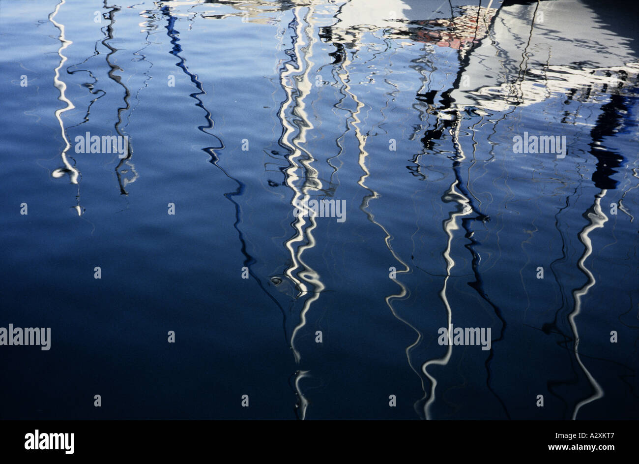 Reflections of boat masts in the sea at Croatia Stock Photo - Alamy