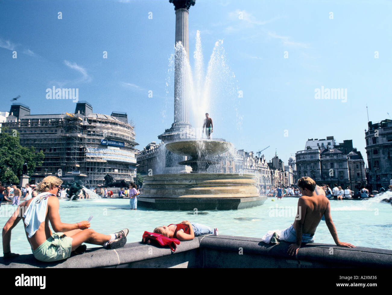 Summer sunbathing at the fountains in "Trafalgar Square" Stock Photo