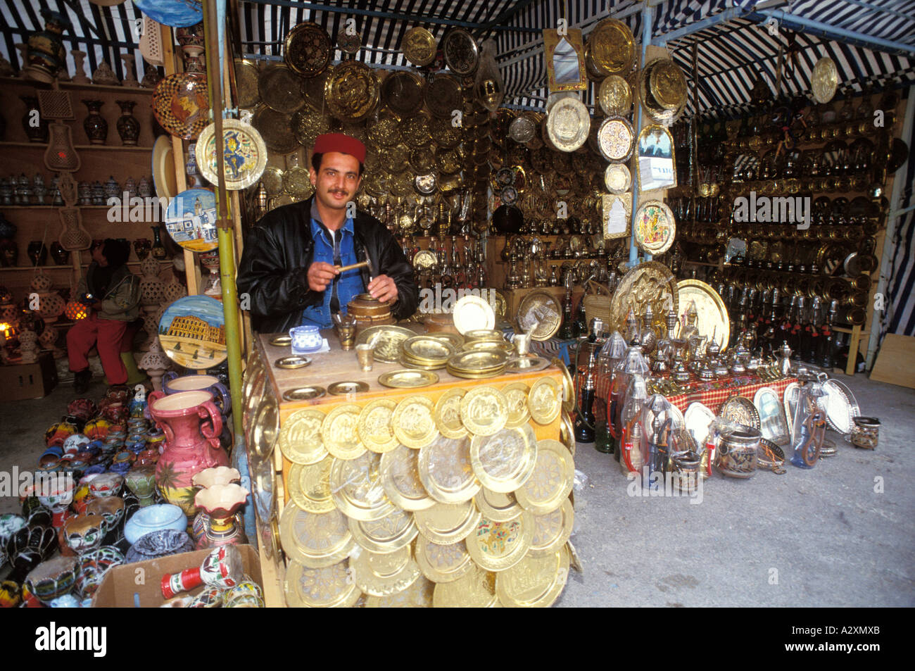 TUNISIA Sidi Bou Said Goldsmith merchant selling his wares Stock Photo