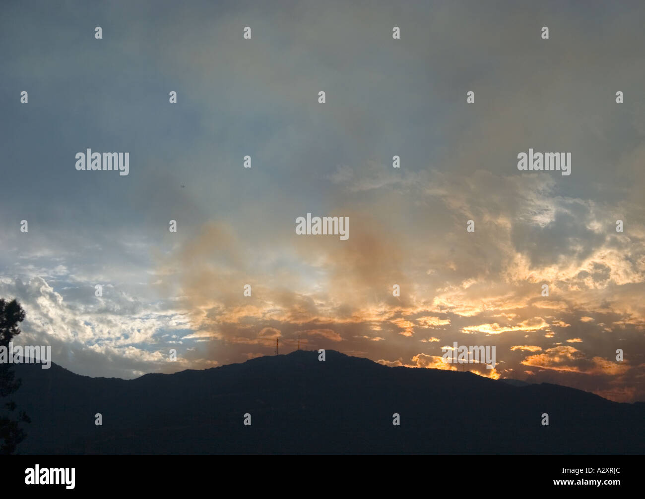 Redish Foreground Shot of redish clouds from the Burbank wildfire in the foreground and ...