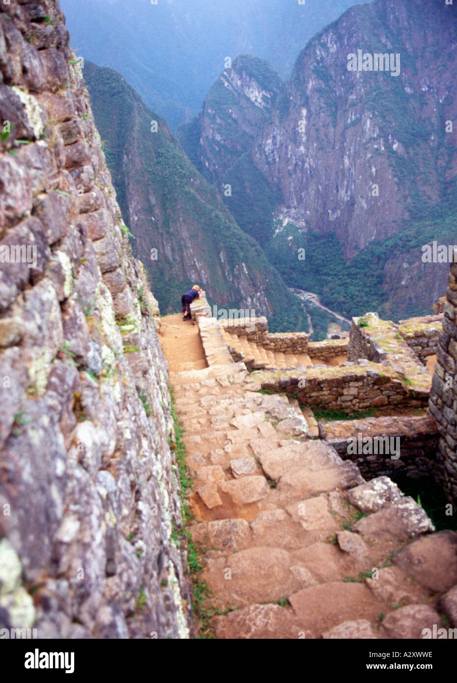 Machu picchu person steps hi-res stock photography and images - Alamy