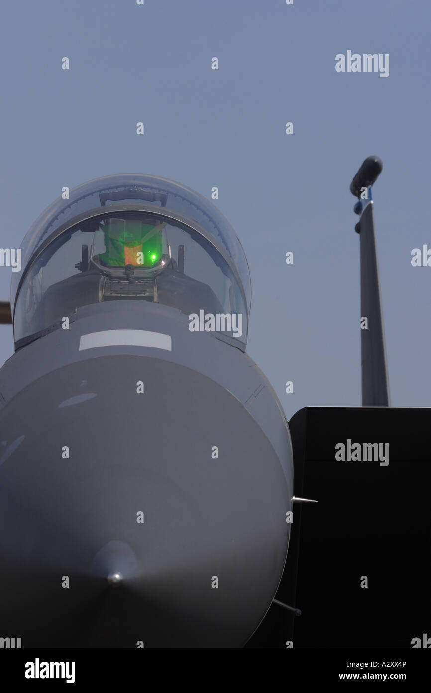 F-15E Eagle modern jet fighter aircraft ground attack bomber with green Head Up Display HUD in cockpit Stock Photo