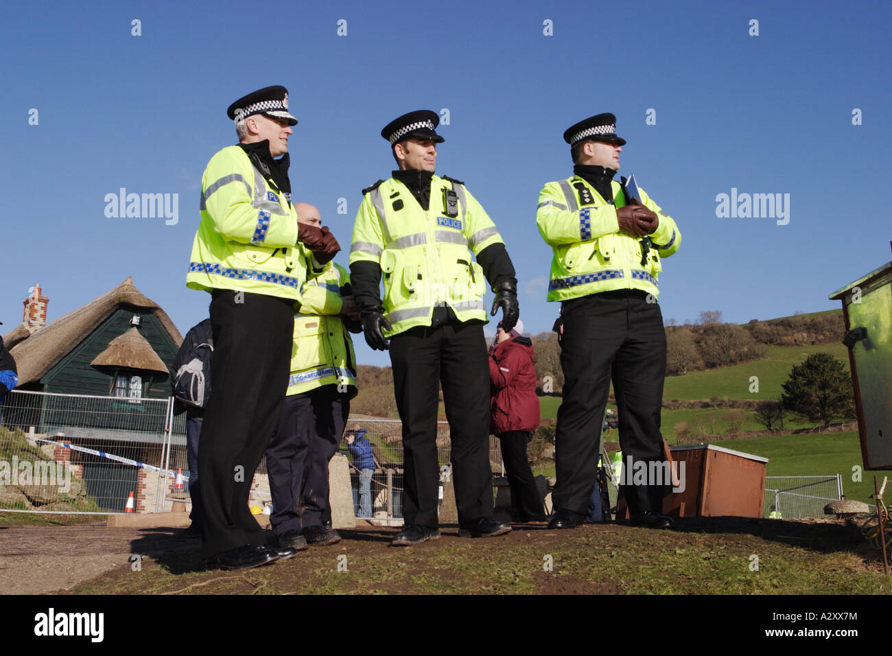 Chief Constable Stephen Otter of the Devon and Cornwall Constabulary on left and senior officers at Branscombe Beach Jan 2007 Stock Photo