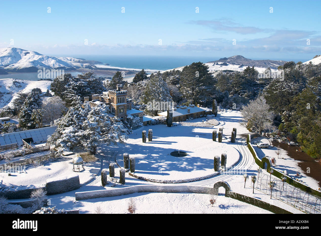 Larnach Castle and snow Otago Peninsula Dunedin South Island New Zealand aerial Stock Photo