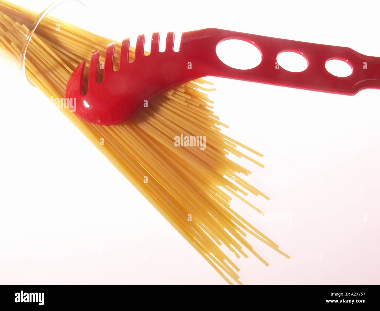 Spaghetti with measuring fork Stock Photo Alamy