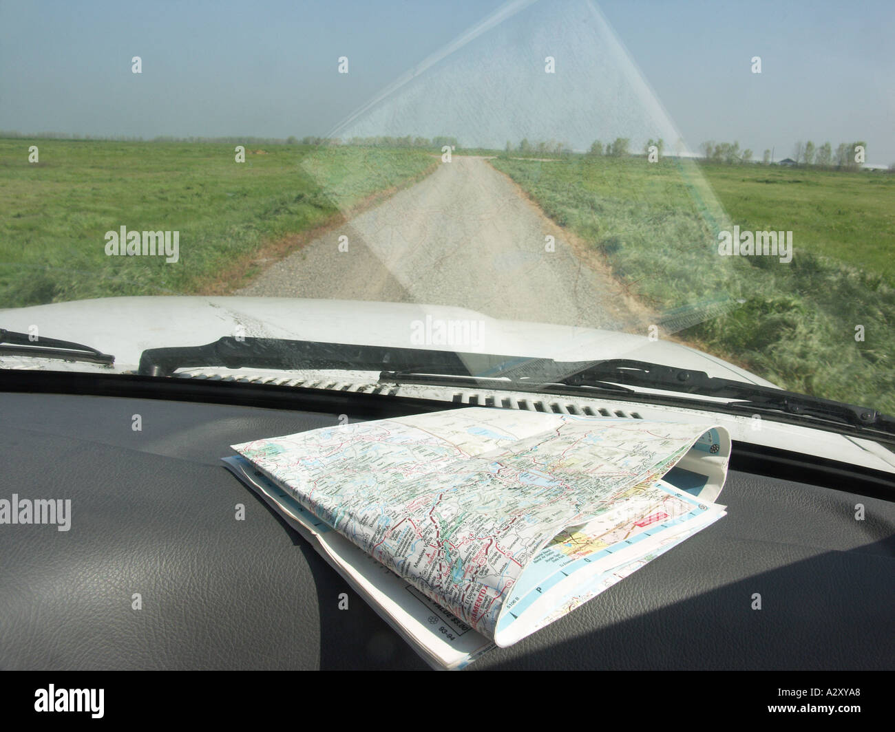 Road map on automobile dashboard Stock Photo