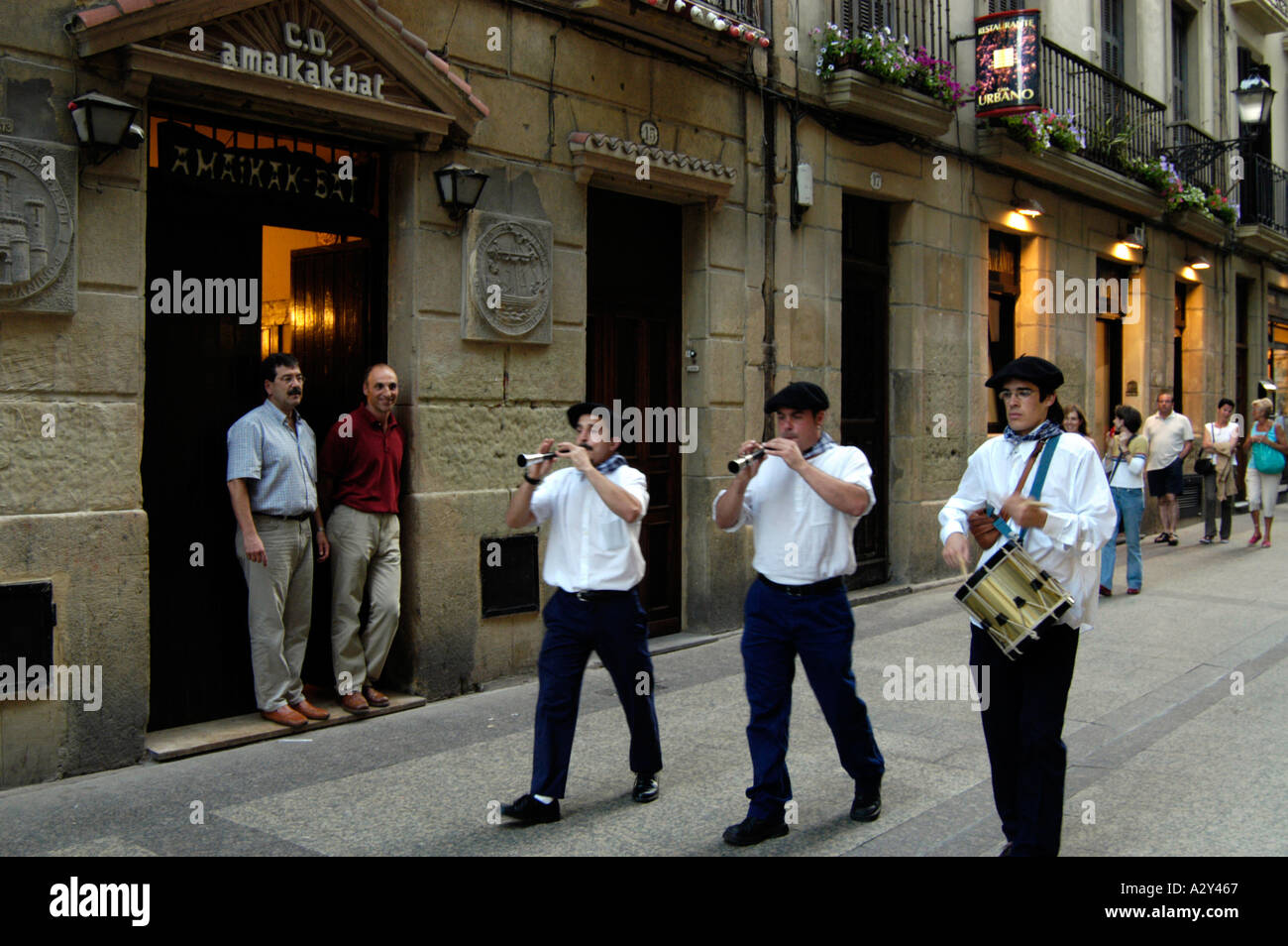 Traditional musicians playing in the streets of the old part of town San Sebastian, Spain Stock Photo