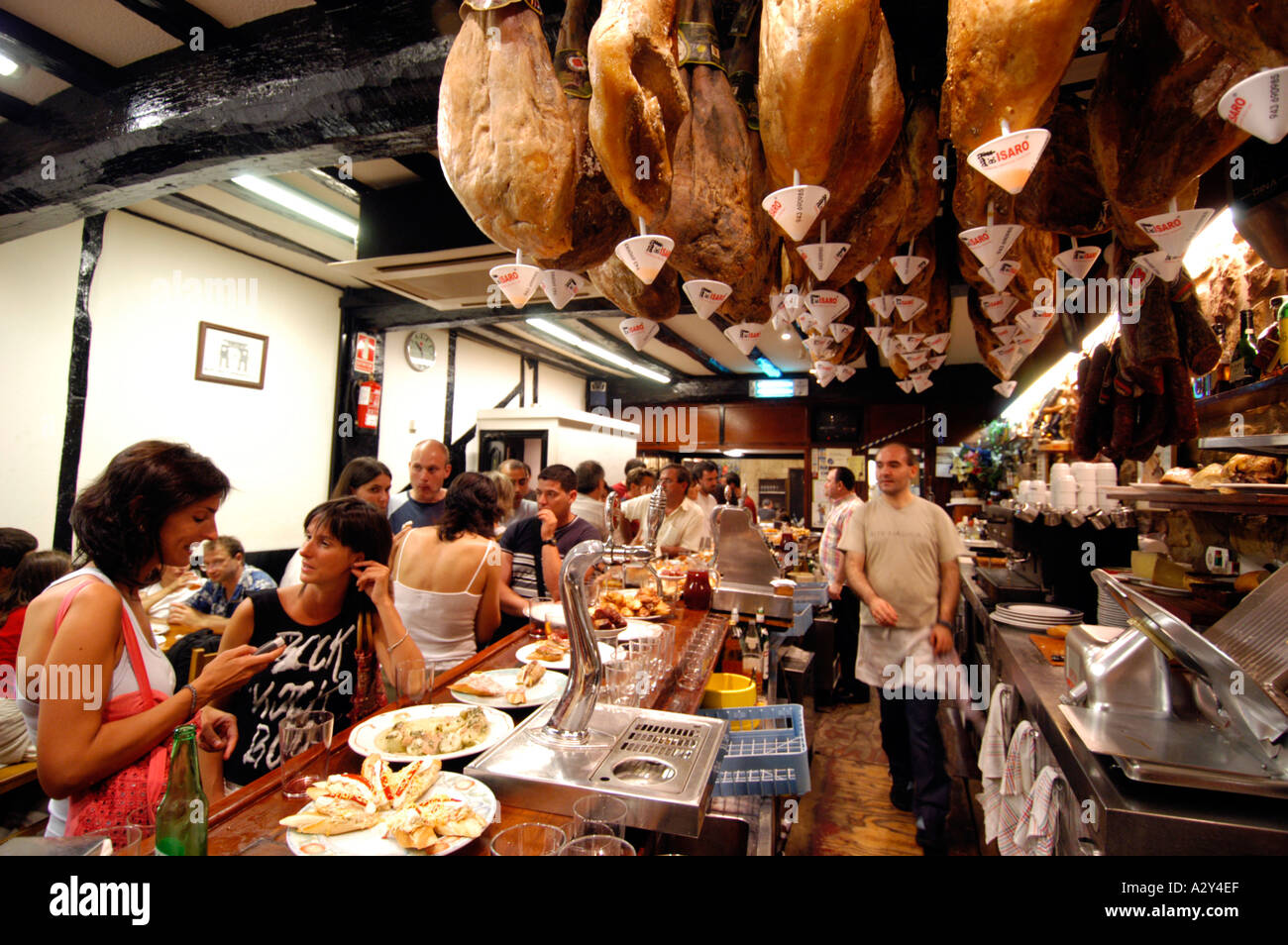 Eating tapas at a bar in San Sebastian, Spain Stock Photo - Alamy