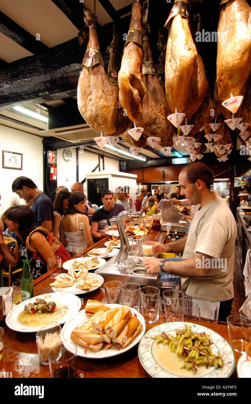 Eating tapas at a bar in San Sebastian, Spain Stock Photo