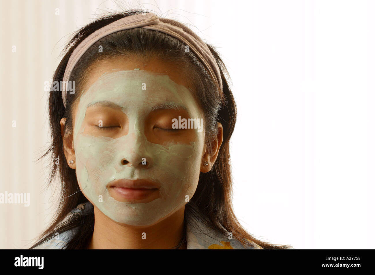 facial beauty treatment woman girl facial mask care aisan happy fresh relax Stock Photo