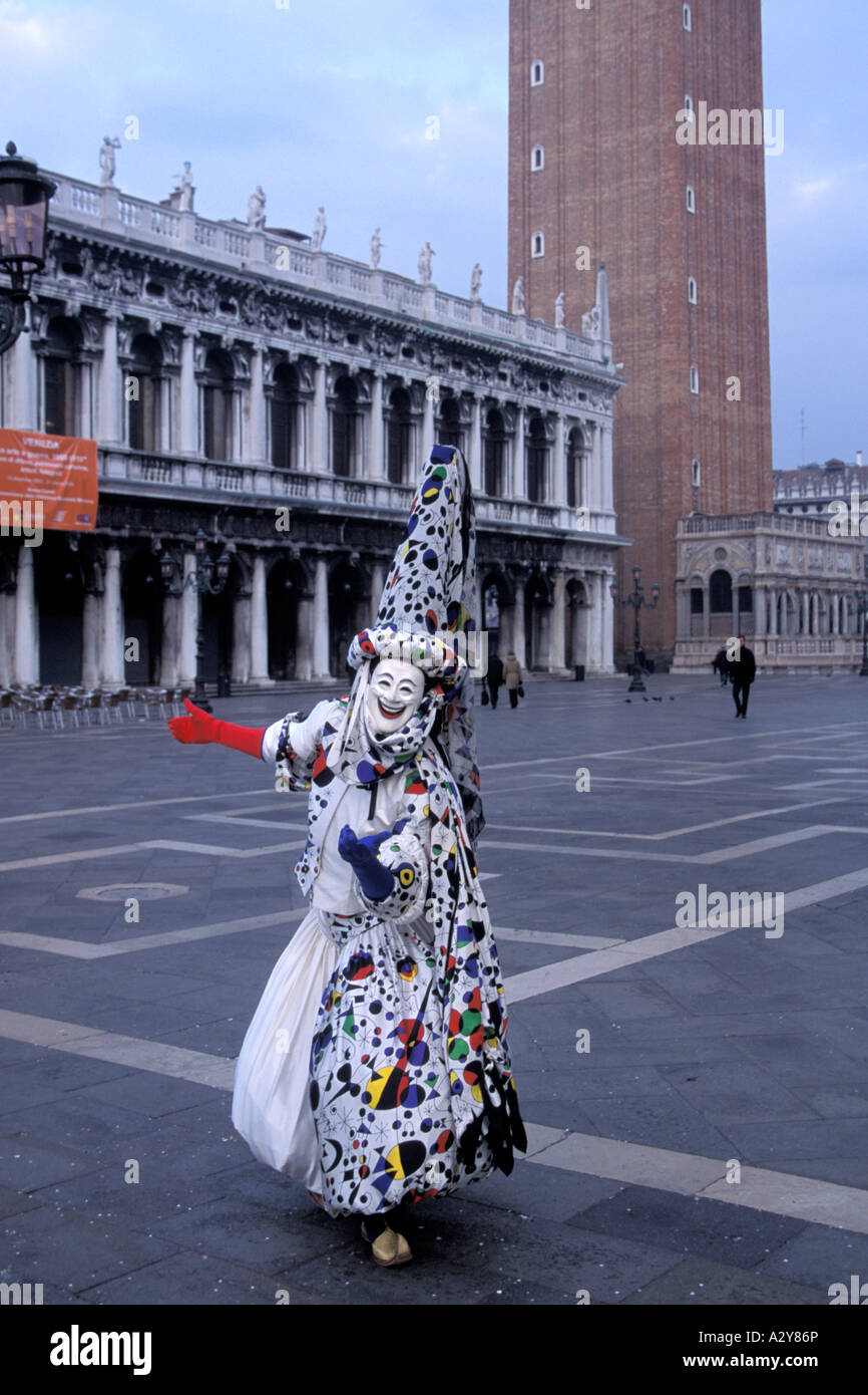 Harlequin in Early Morning at St. Mark's Square during Carnevale in Venice, Italy Stock Photo
