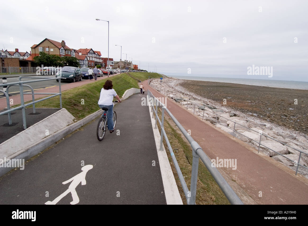 Cycling on Cycle Path Rhos on Sea Conwy North East Wales Stock Photo
