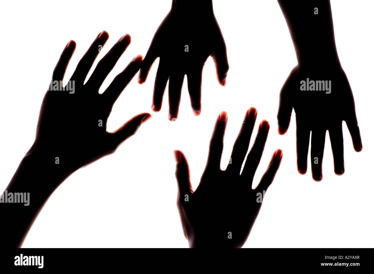 Hand Backlit Four young kids' hands backlit Stock Photo - Alamy